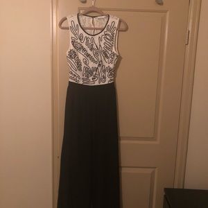 Lush black and white jumpsuit w/ button back